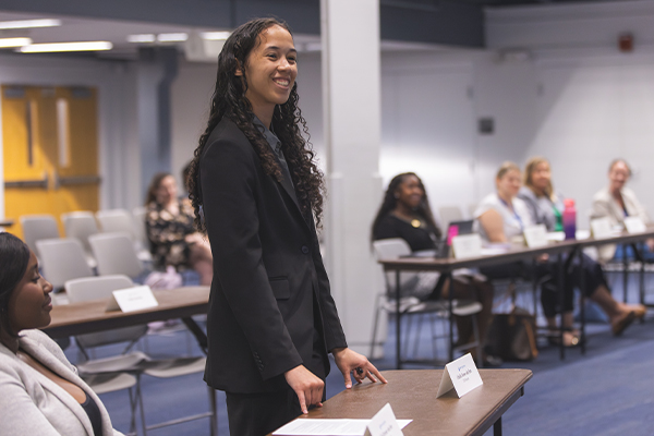 student standing to speak at SGA meeting