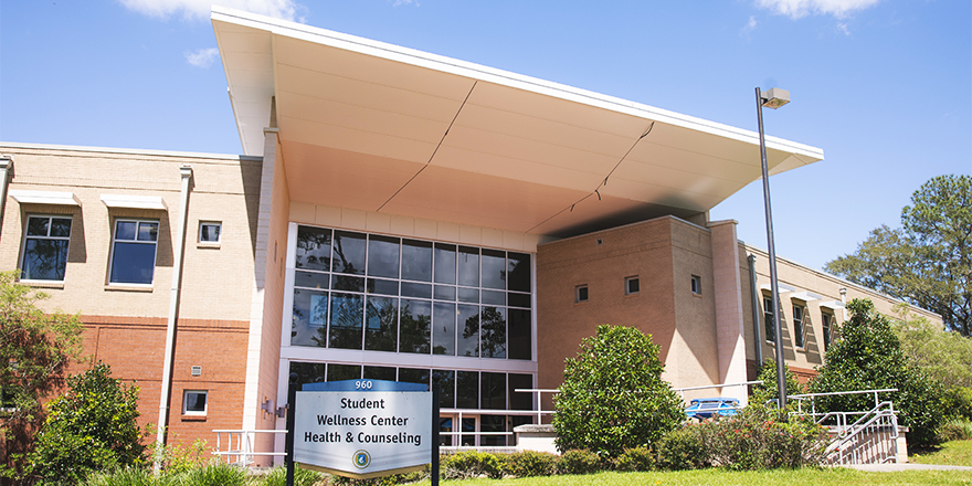 Building 960 front entrance of Student Wellness Center Health