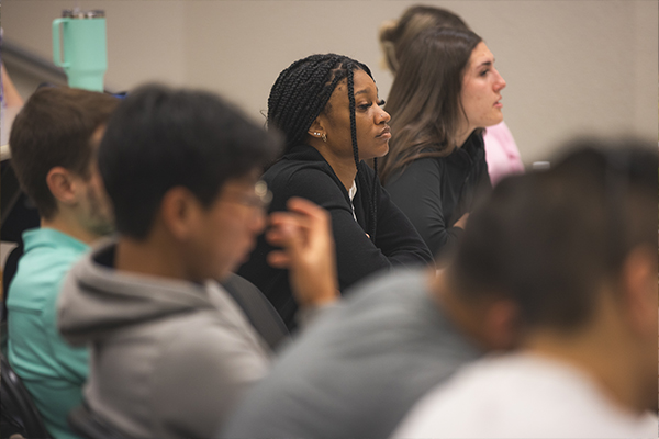 Group of students sitting in a classroom.