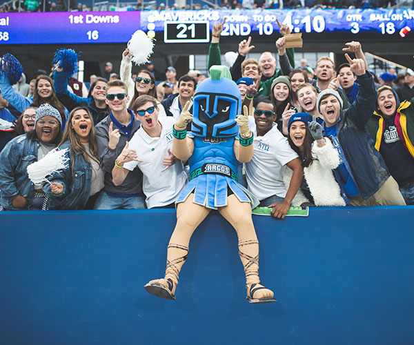 argie the argonaut cheering on uwf with students at the national championship