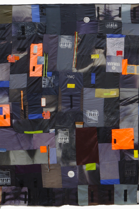 Collage of various fabrics in contrasting black and orange