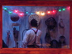 A student performing in UWF Theatres production of 1940s Radio Hour