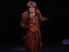 A student performing in UWF Theatres production of A Christmas Carol