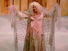 A student performing in UWF Theatres production of The House of Bernarda Alba