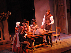 Students performing in UWF Theatres production of A Christmas Carol