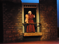 A student performing in UWF Theatres production of A Christmas Carol