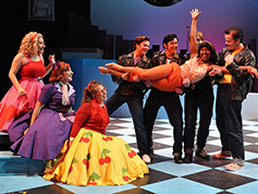 Students performing in UWF Theatres production of Grease