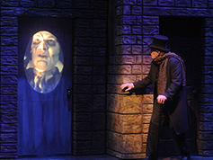 A student performing in UWF Theatres production of A Christmas Carol
