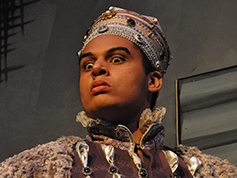 A student performing in UWF Theatres production of Rosencrantz and Guildenstern Are Dead
