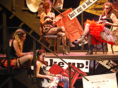 Students performing in UWF Theatres production of The Threepenny Opera