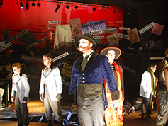 Students performing in UWF Theatres production of The Threepenny Opera