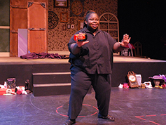 A student performing in UWF Theatres production of Anton in Show Business