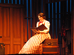 A student performing in UWF Theatres production of Little Women