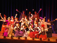 Students performing in UWF Theatres production of The Mystery of Edwin Drood