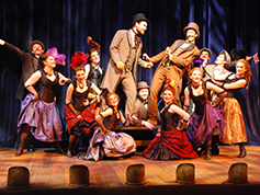 Students performing in UWF Theatres production of The Mystery of Edwin Drood