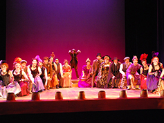Students performing in UWF Theatres production of The Mystery of Edwin Drood