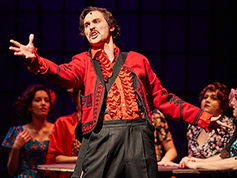 A student performing in UWF Theatres production of Evita
