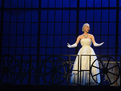 A student performing in UWF Theatres production of Evita