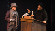 Scrooge and Fred in Scrooge's office