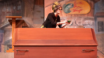 A student performing in UWF Theatres production of Dearly Departed