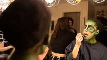 Students applying makeup for UWF Theatres production of The Little Mermaid