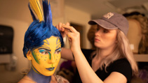 Students applying makeup for UWF Theatres production of The Little Mermaid