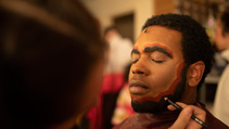 Students applying makeup for UWF Theatres production of The Little Mermaid