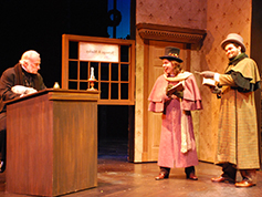 Students performing in UWF Theatres production of A Christmas Carol