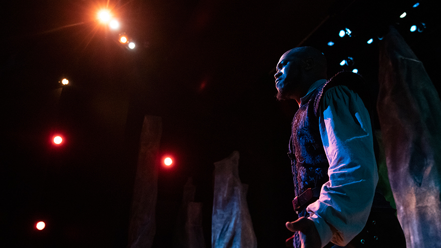 A student performing in UWF Theatres production of Othello