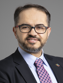 Dr. Hasan Buker