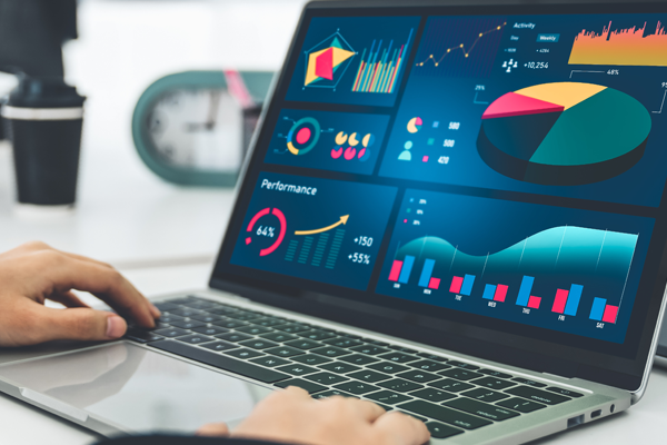Laptop computer with data charts displayed