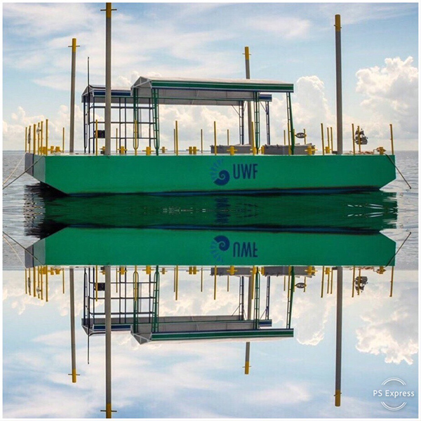 The MSC Dive Platform on site on a calm day with the reflection 