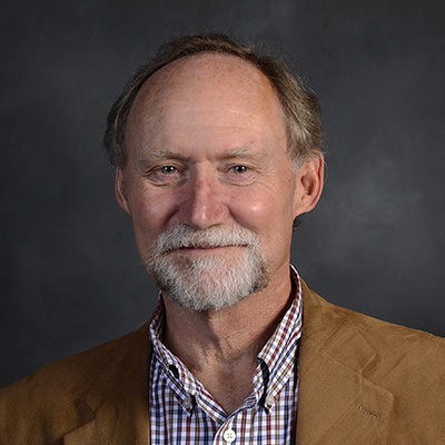 John Bratten indoor headshot.