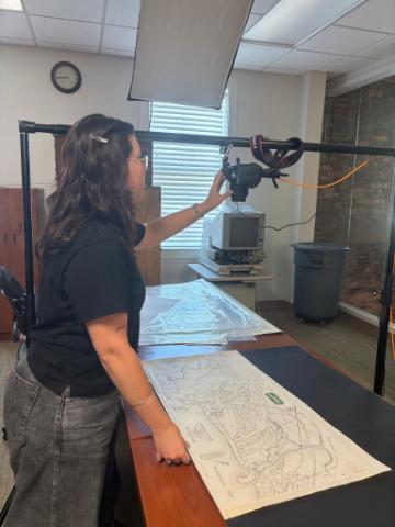 A student engaged in digital cartography.