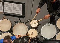 Percussion instruments being played by students