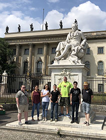 students and faculty pose in germany during study abroad program