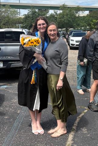 A Spring 2026 CASSH graduate with her mother at graduation