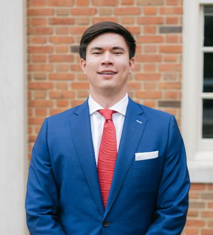 James Greene in a blue suit.