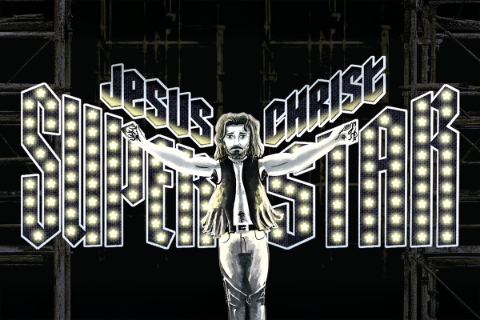 Jesus Christ Superstar poster with a male figure dressed in 70's garb standing with arms outspread.