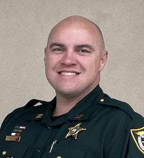 An Okaloosa County Sheriff's Captain in uniform.