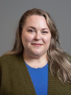 Ashley Faulkner indoor headshot.