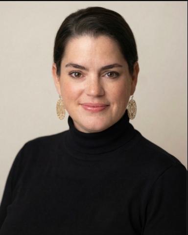 Ashley Toland indoor headshot.