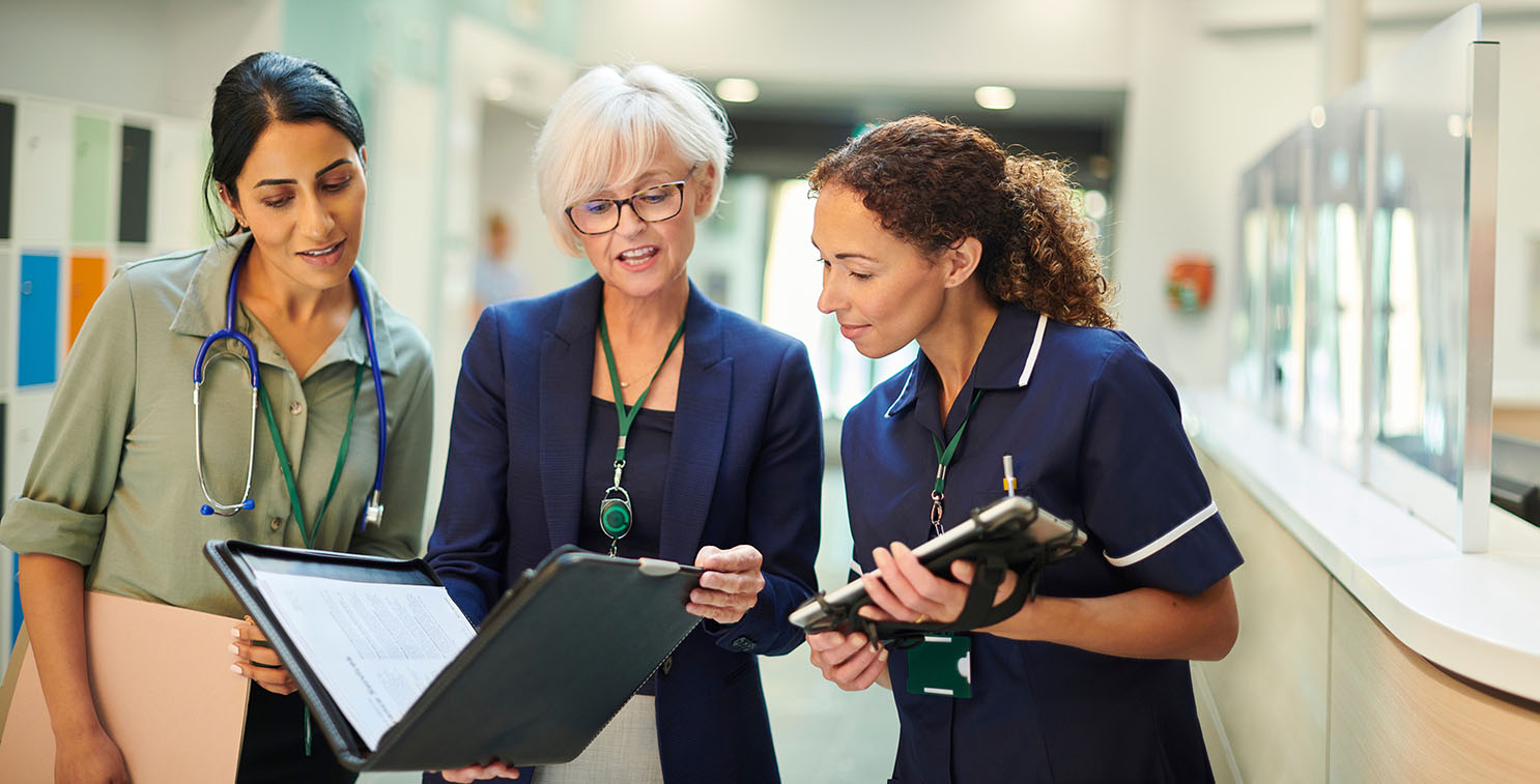 Healthcare Administrator working with medical team