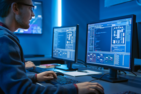 student at multiple computers
