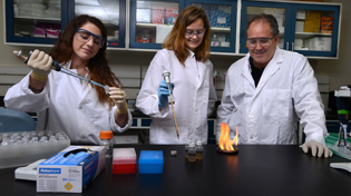 Wade Jeffrey, Adelyn Benz, Katelyn Houghton studying oil spill