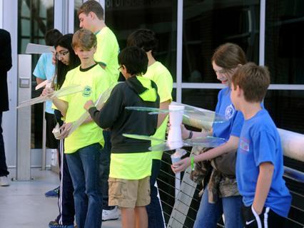 Students get ready for the Rotor Egg Drop Saturday during the Northwest Florida Regional Science Olympiad Competition at the University of West Florida.