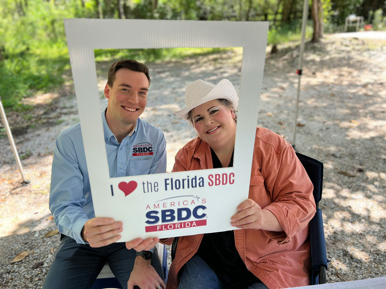 Florida SBDC employee Colton Currier holds an 