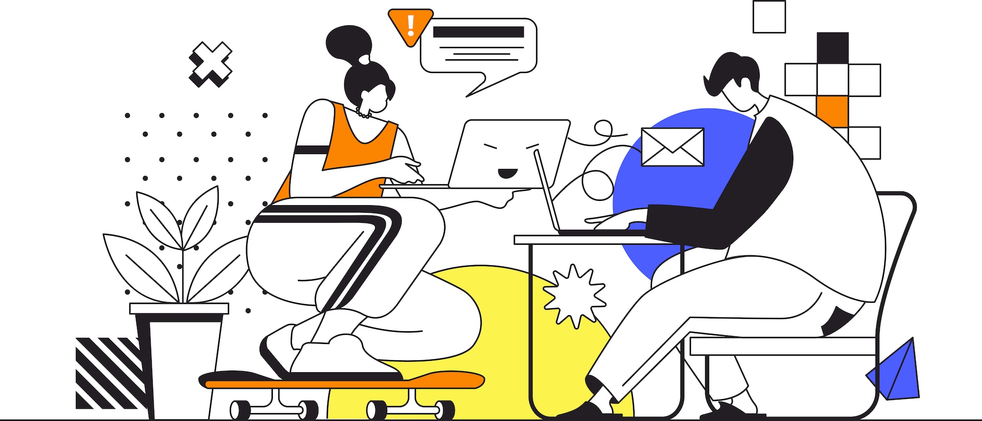 Two people seated at desks working on laptops