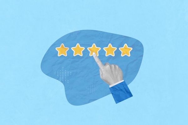 Man points to five gold stars