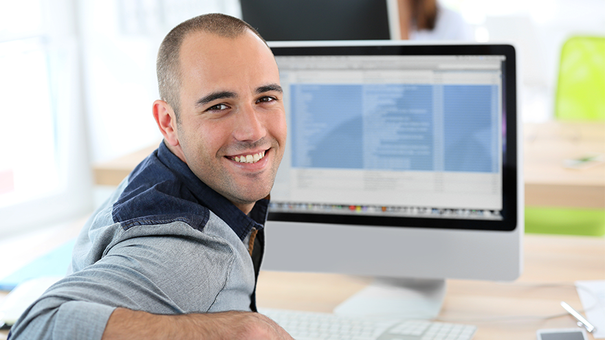 UWF student on computer